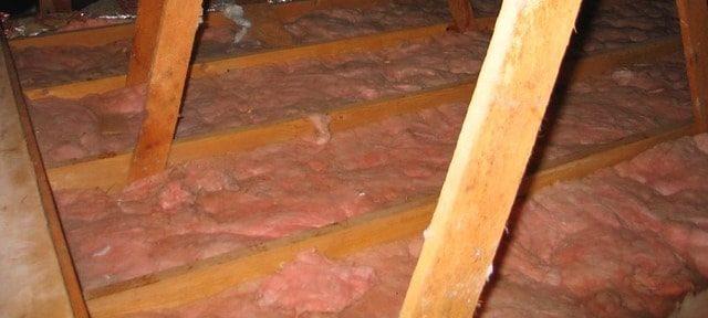 Blanket insulation in an attic.